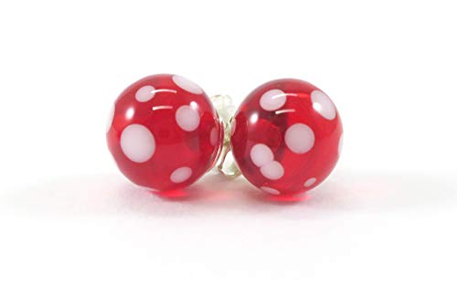 Aretes de cristal de Murano azul cobalto con puntos blancos.