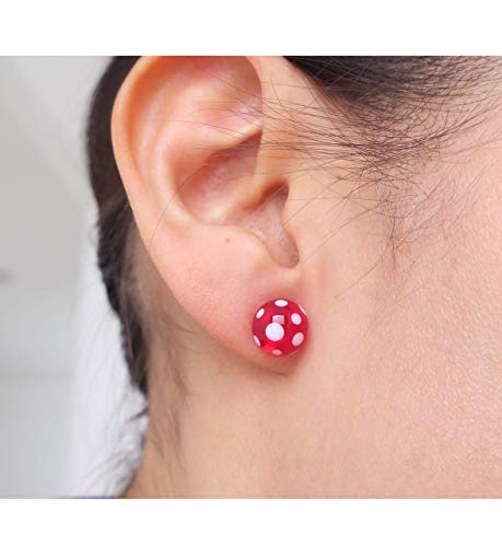 Aretes de cristal de Murano azul cobalto con puntos blancos.