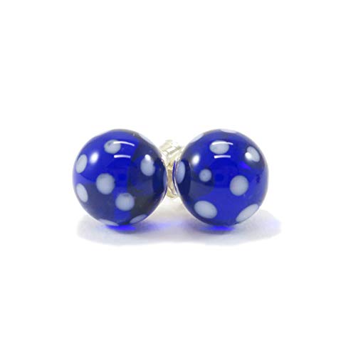 Cobalt blue Murano glass earrings with white dots.
